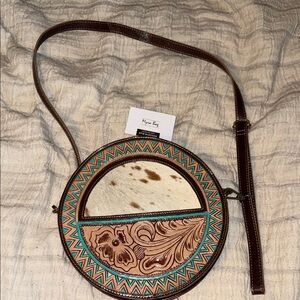 Myra Round Leather Crossbody Bag with Floral Design